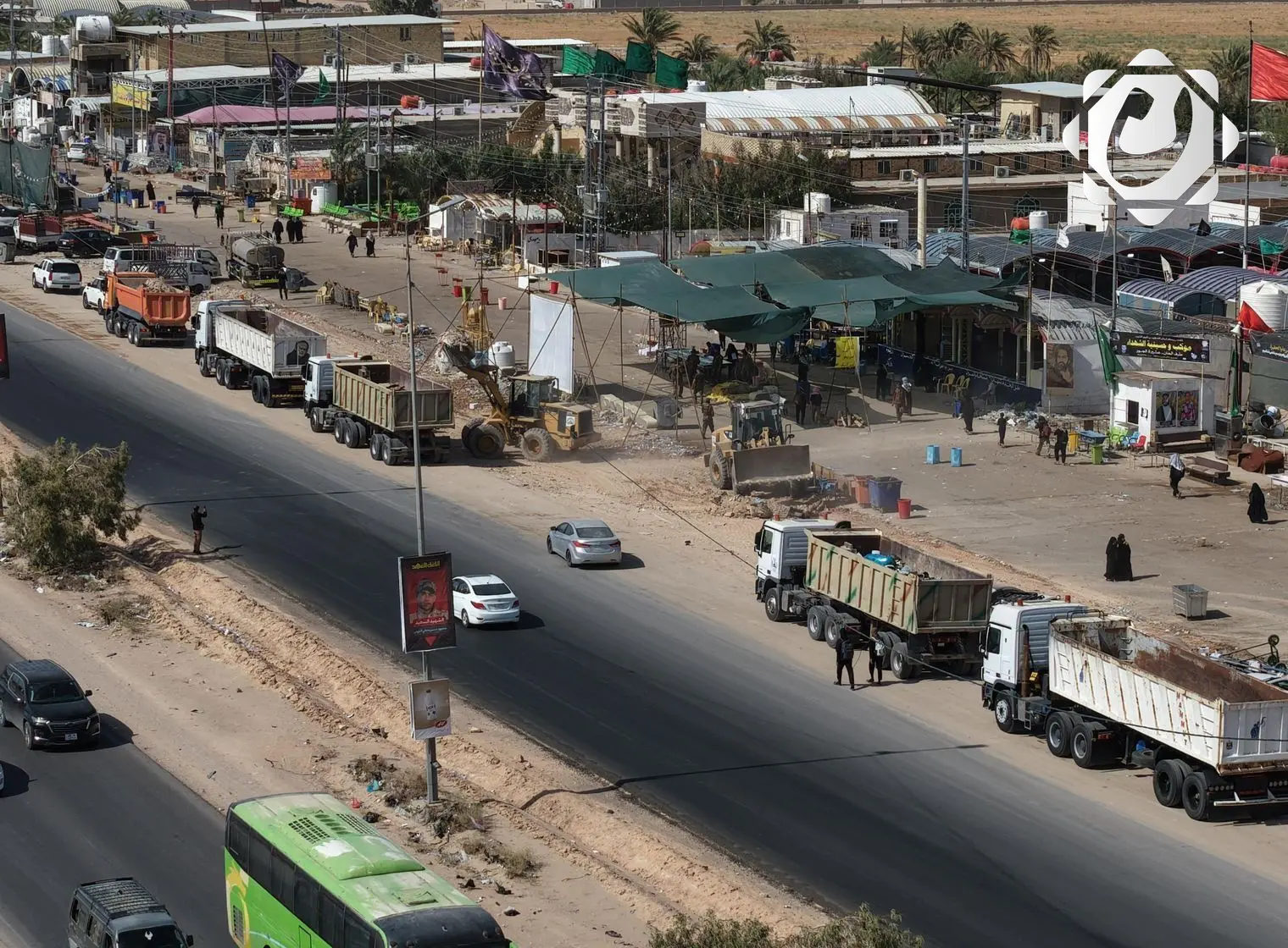 الحشد الشعبي يطلق حملة لدعم بلدية النجف الأشرف على طريق الزائرين نحو كربلاء