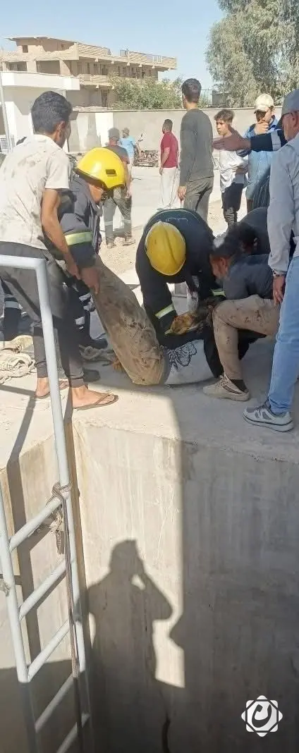 الدفاع المدني في هيت ينقذ عاملاً من موت محقق